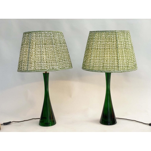 142 - TABLE LAMPS BY POOKY LIGHTING, a pair, green 'glass' of slim waisted form with green printed lamp sh... 