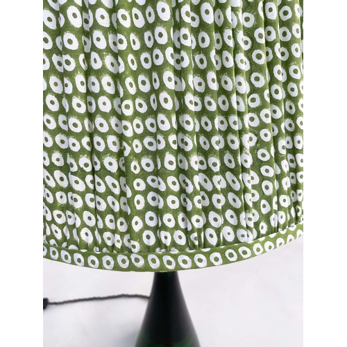 142 - TABLE LAMPS BY POOKY LIGHTING, a pair, green 'glass' of slim waisted form with green printed lamp sh... 