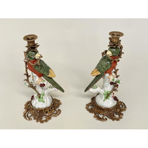 160 - PARROT CANDLESTICKS, a pair, Continental style decorated porcelain and gilt metal mounted, 36cm H. (... 