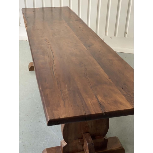 172 - YEWWOOD REFECTORY TABLE, 20th century Welsh solid yewwood with three plank top, twin trestles and st... 