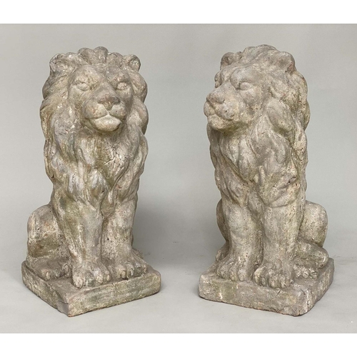 180 - GARDEN LIONS, a pair, well weathered reconstituted stone and terracotta seated, 75cm H. (2)