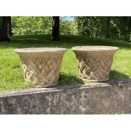 182 - GARDEN PLANTERS, a pair, weathered re constituted stone, circular tapered with 'woven' lattice sides... 