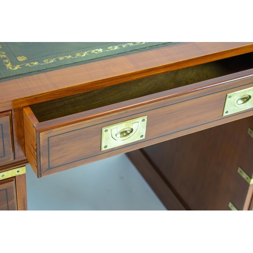 192 - CAMPAIGN STYLE PEDESTAL DESK, 77cm H x 121cm x 58cm D, yewwood and brass bound with leather top abov... 