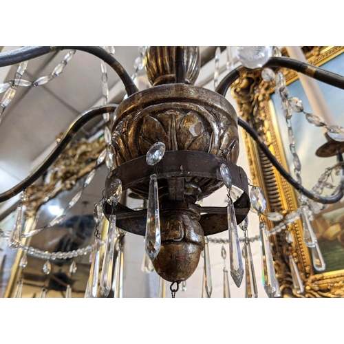 199 - CHANDELIERS, a pair, approx 115cm H x 80cm W, late 19th century, with a silvered wood stem, metal br... 