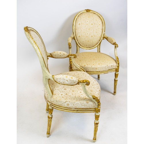 261 - ARMCHAIRS, a pair, George III painted and parcel gilt, circa 1785, in patterned cream upholstery, 96... 