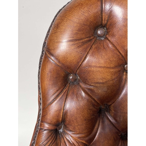 266 - LIBRARY ARMCHAIRS, a pair, Queen Anne style buttoned tan leather each with arched back and cabriole ... 