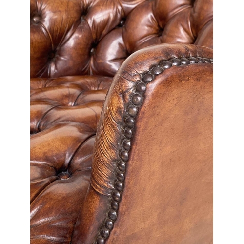 266 - LIBRARY ARMCHAIRS, a pair, Queen Anne style buttoned tan leather each with arched back and cabriole ... 