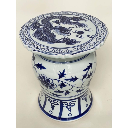 272 - CHINESE STOOLS, a pair, blue and white ceramic with dragon and leaf decoration, 40cm H x 33cm W. (2)