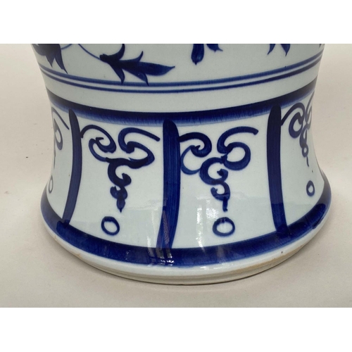 272 - CHINESE STOOLS, a pair, blue and white ceramic with dragon and leaf decoration, 40cm H x 33cm W. (2)