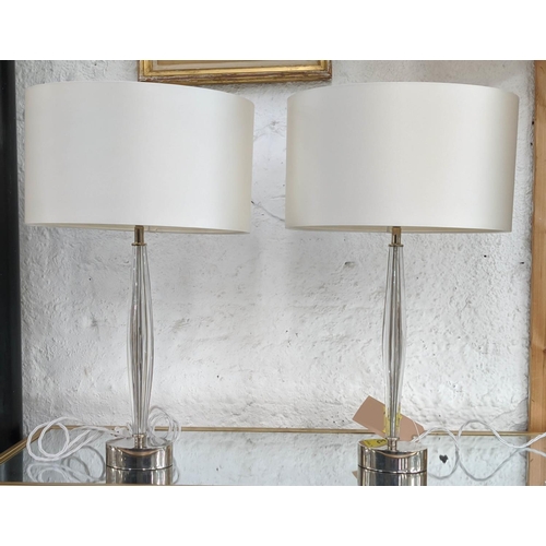 312 - TABLE LAMPS, a pair, 67cm H, Murano style slender glass with polished metal bases, with shades.