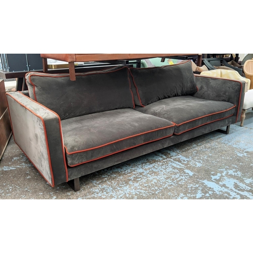 322 - LOVE YOUR HOME BYRON SOFA, 250cm x 109cm x 68cm, grey velvet upholstered with orange piping detail.