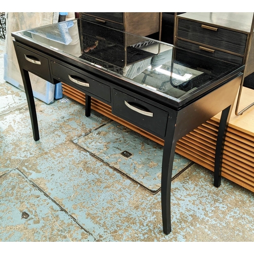 336 - DRESSING TABLE, ebonised with three drawers, smoked glass top, 120cm x 50cm x 75cm.