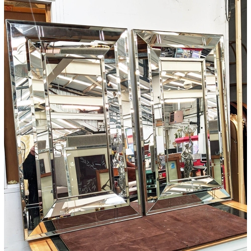 394 - LOUISE BRADLEY WALL MIRRORS, a pair, mirrored frames, 121cm x 73.5cm. (2)