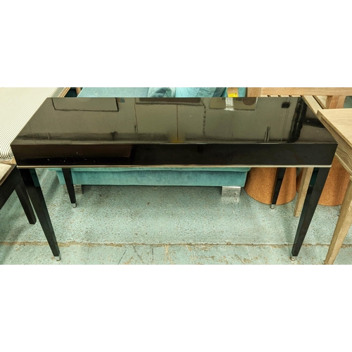 492 - CONSOLE TABLE, contemporary black lacquered design, polished metal detail, 131cm x 46cm x 74cm.