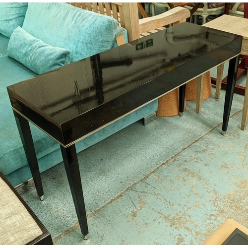 492 - CONSOLE TABLE, contemporary black lacquered design, polished metal detail, 131cm x 46cm x 74cm.