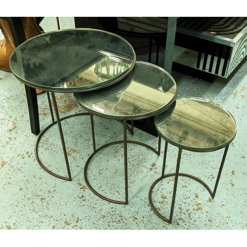 501 - NEST OF TABLES, a set of three, antiqued mirrored tops, 45cm diam x 47cm H at largest. (3)