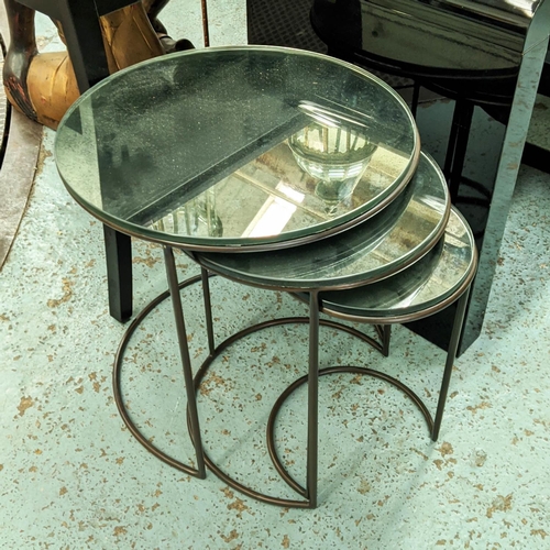 501 - NEST OF TABLES, a set of three, antiqued mirrored tops, 45cm diam x 47cm H at largest. (3)