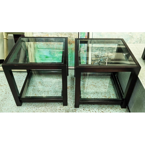 503 - SIDE TABLES, a pair, ebonised with two glass tiers, 46cm x 46cm x 46cm. (2)