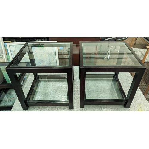 504 - SIDE TABLES, a pair, ebonised with two glass tiers, 46cm x 46cm x 46cm. (2)