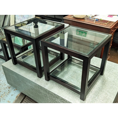 504 - SIDE TABLES, a pair, ebonised with two glass tiers, 46cm x 46cm x 46cm. (2)