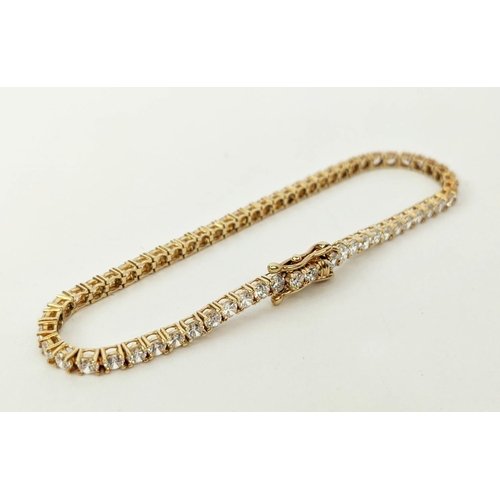 37 - A 14CT GOLD WHITE STONE BRACELET, 16cm long, 6.78 grams.