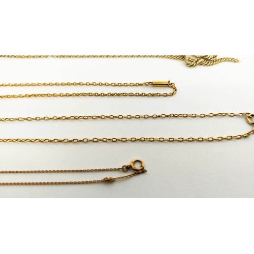 12 - A 15CT GOLD FINE LINK CHAIN NECKLACE, 52cm long, plus two further yellow metal chains, the largest p... 