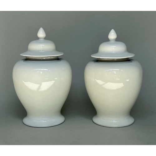 348 - TEMPLE JARS, a pair, Chinese white ceramic, with lids, 58cm H. (2)