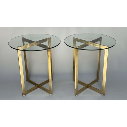 349 - SIDE TABLES, a pair, 1970s heavy brass framed, x form with circular glass tops, 60cm W x 65cm H. (2)