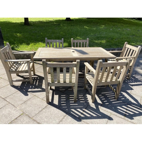 353 - GLOSTER GARDEN TABLE AND BARLOW-TYRIE ARMCHAIRS, silver weathered teak, table 176cm W x 90cm D x 70c... 