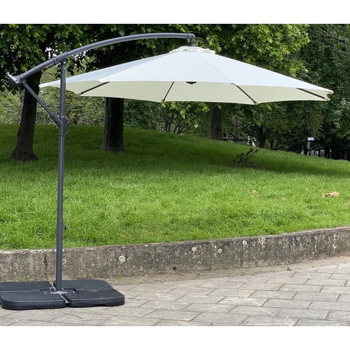 354 - SUN UMBRELLA, circular cream canvas retractable wind up with frame and weights, 300cm W. (6)