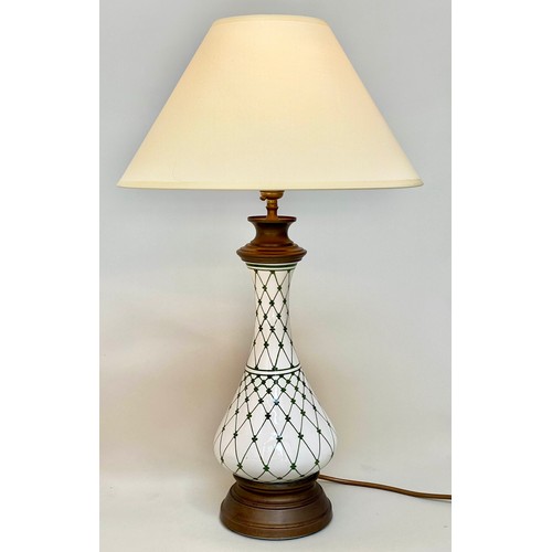 148 - TABLE LAMPS, a pair, baluster form vase shaped and trellis decorated with gilt metal mounts and shad... 