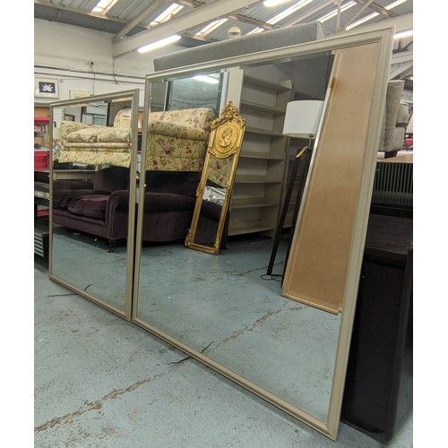 495 - BATHROOM MIRRORS, two, one 116cm x 143cm, the other 138cm x 151cm, with a bevelled plate and electro... 