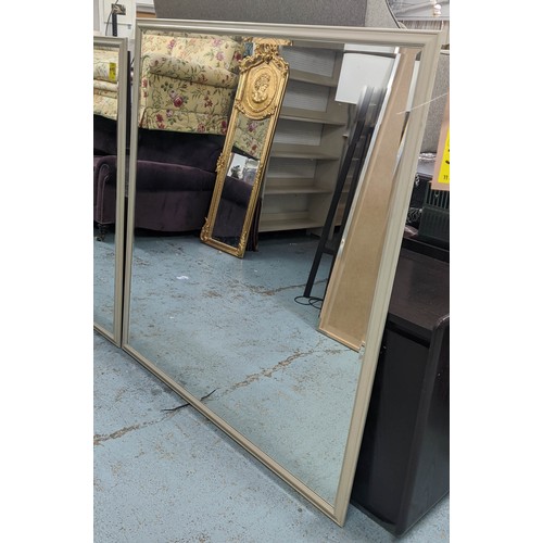 495 - BATHROOM MIRRORS, two, one 116cm x 143cm, the other 138cm x 151cm, with a bevelled plate and electro... 