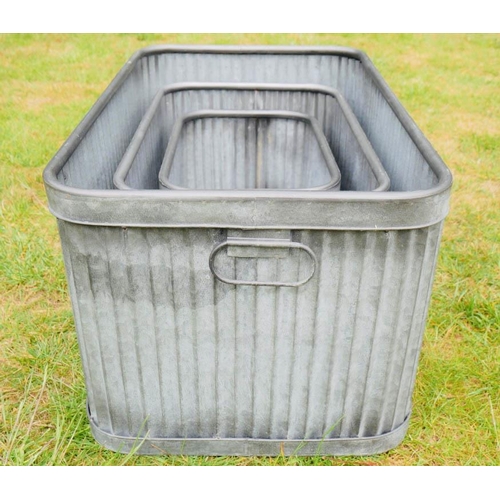 338 - TROUGH PLANTERS, a graduated set of three, galvanised, 33cm x 60cm x 38cm at largest (3)