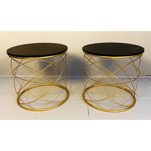 334 - SIDE TABLES, a pair, 45cm H x 46cm diam., 1970s Italian style, gilt metal bases, ebonised circular w... 