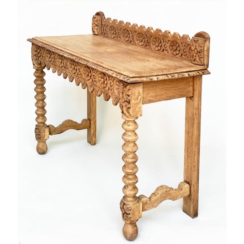 156 - HALL TABLE, 19th century Gothic carved oak with raised back, 104cm W x 92cm W cm x 42cm D.