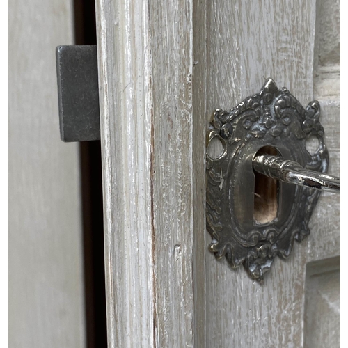 158 - ARMOIRE, French style traditionally grey painted with two panelled doors enclosing hanging space abo... 