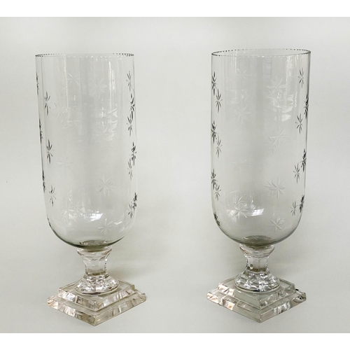 163 - STORM LANTERNS, a pair, cut glass of vase form engraved with stepped plinth base, 40cm H. (2)