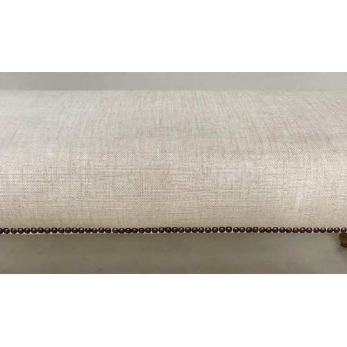 166 - WINDOW SEAT, rectangular brass studded linen upholstered with turned supports, 108cm W x 40cm H x 44... 