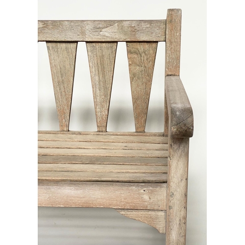 167 - GARDEN BENCH, weathered teak of slatted construction with triangular splat back, 140cm W.