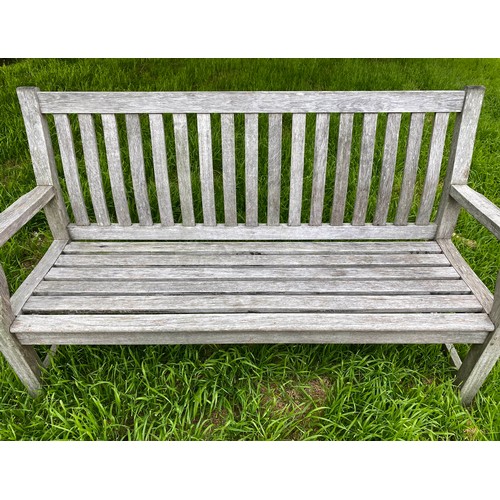 169 - GARDEN BENCH, silvery weathered teak of slatted and pegged construction, 152cm W.