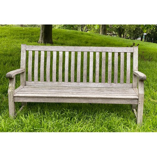 169 - GARDEN BENCH, silvery weathered teak of slatted and pegged construction, 152cm W.