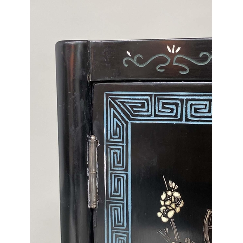 201 - CHINESE SIDE CABINET, lacquered with incised polychrome Chinoiserie decoration and two panel doors, ... 