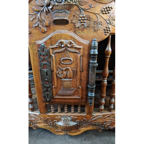 195 - A FRENCH WALNUT PANETIERE, probably 19th century carved frieze spindle gallery front and sides, sing... 