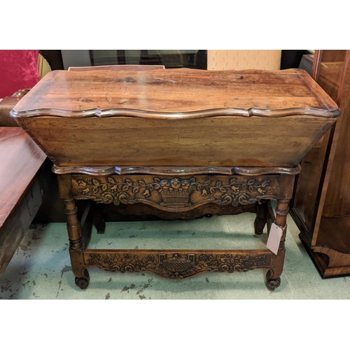 196 - A FRENCH WALNUT DOUGH BIN, late 18th/early 19th century lidded top carved frieze drawer to base, tur... 