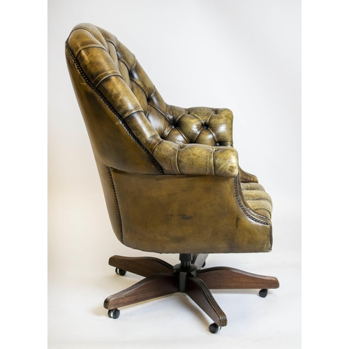 197 - DESK CHAIR, 102cm H x 79cm W, tan leather with revolving and reclining seat.