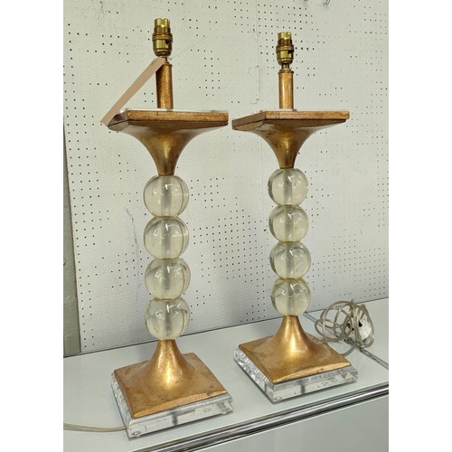 450 - TABLE LAMPS, a pair, of ball form with gilt leaf detail and perspex base, 63cm H. (2)