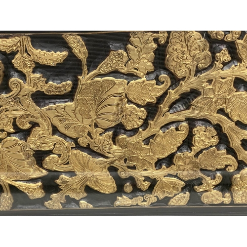 168 - LOW TABLE, Chinese lacquered and gilt, rectangular with carved giltwood foliate panel and glass top,... 