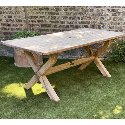 299 - GARDEN TABLE, rectangular weathered teak and slatted with substantial X frame support, 86cm x 183cm ... 