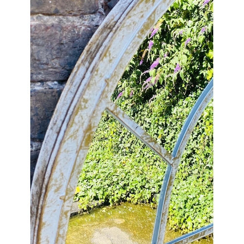 410 - ARCHITECTURAL GARDEN MIRRORS, a pair, 160cm high, 67cm wide, arched aged metal frames. (2)